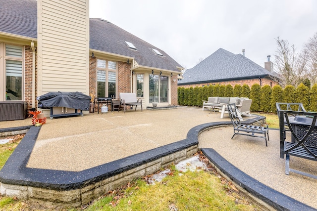 view of patio with central air condition unit, an outdoor hangout area, and area for grilling