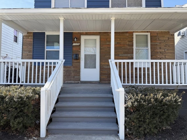 entrance to property with covered porch