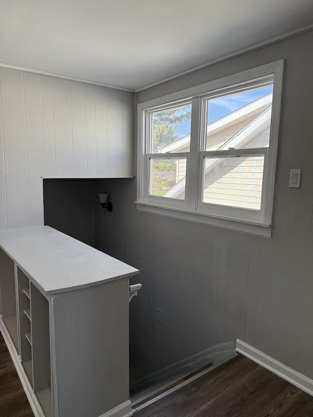 unfurnished office featuring dark wood-type flooring