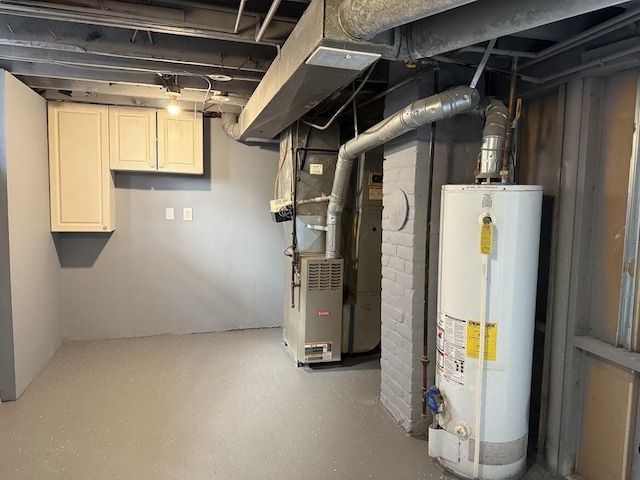 unfinished below grade area featuring gas water heater and heating unit