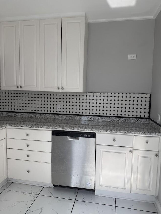 kitchen featuring dishwasher, marble finish floor, white cabinetry, and ornamental molding