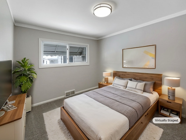 bedroom with visible vents, baseboards, carpet, and ornamental molding