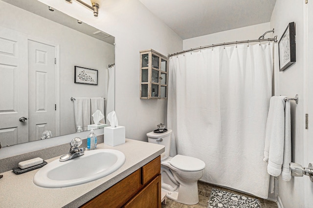 bathroom featuring visible vents, toilet, curtained shower, wood finished floors, and vanity