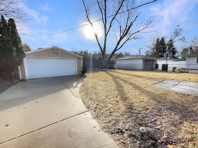 view of front of house with an outbuilding and a detached garage