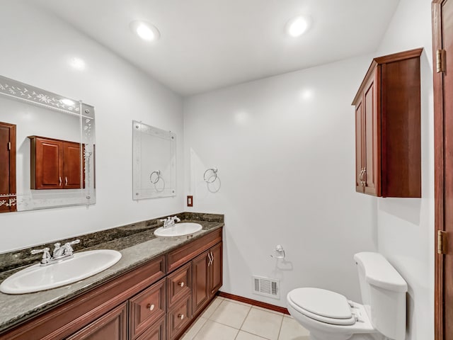 full bath with tile patterned flooring, toilet, visible vents, and a sink