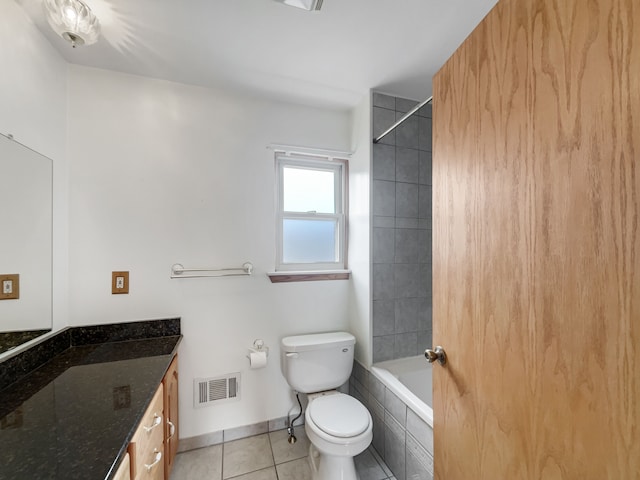 bathroom featuring visible vents, toilet, tile patterned flooring, baseboards, and vanity