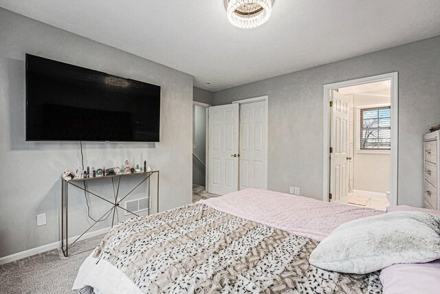 bedroom featuring visible vents, baseboards, and carpet floors