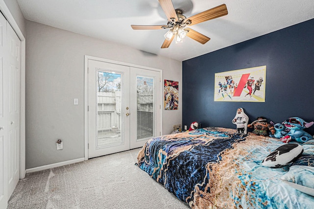 carpeted bedroom featuring access to exterior, french doors, baseboards, and ceiling fan