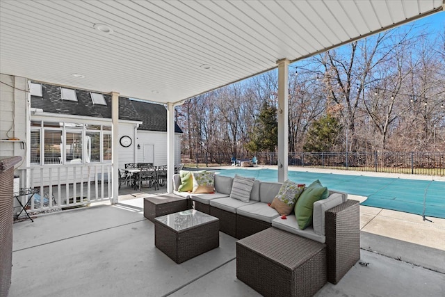 view of patio featuring a fenced in pool, outdoor lounge area, outdoor dining area, and a fenced backyard