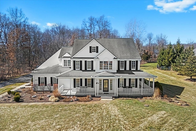 view of front of property featuring a porch and a front yard