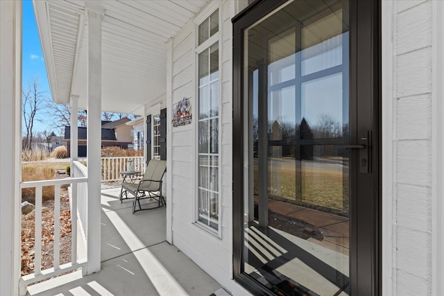 doorway to property with covered porch