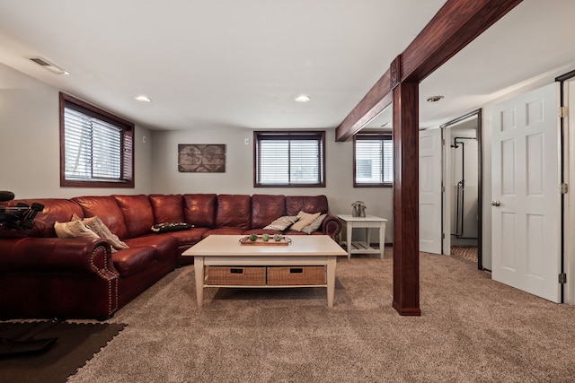 living room featuring recessed lighting, visible vents, and carpet floors