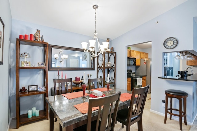 dining room with lofted ceiling, light carpet, baseboards, and a chandelier