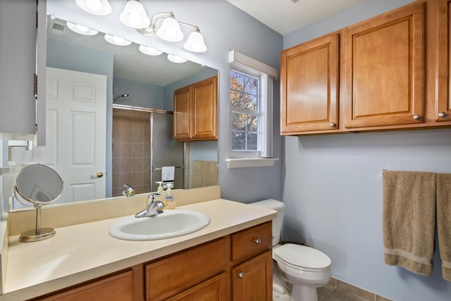 full bathroom featuring vanity, toilet, a shower, and visible vents