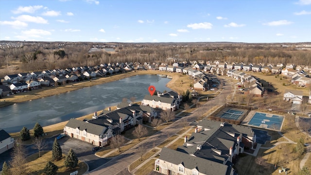 aerial view with a residential view and a water view