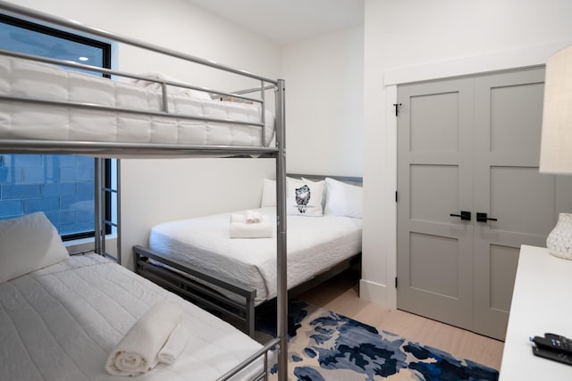 bedroom featuring light wood finished floors