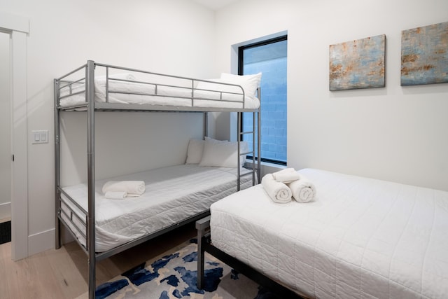 bedroom featuring wood finished floors