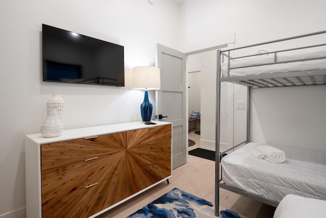 bedroom with light wood-style flooring