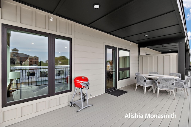300 Washington Ave Unit 1, Grand Haven, MI 49417 - wooden terrace with outdoor dining area