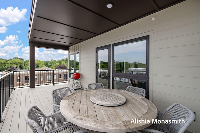 300 Washington Ave Unit 1, Grand Haven, MI 49417 - deck with outdoor dining area