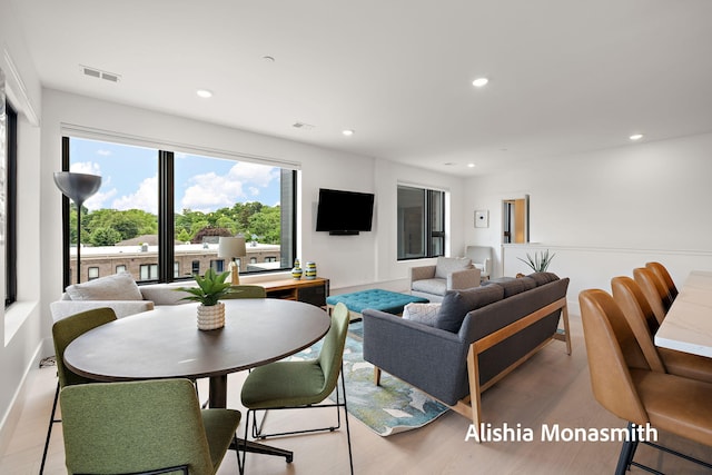 300 Washington Ave Unit 1, Grand Haven, MI 49417 - living area featuring wood finished floors and recessed lighting