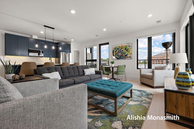300 Washington Ave Unit 1, Grand Haven, MI 49417 - living room featuring plenty of natural light and recessed lighting