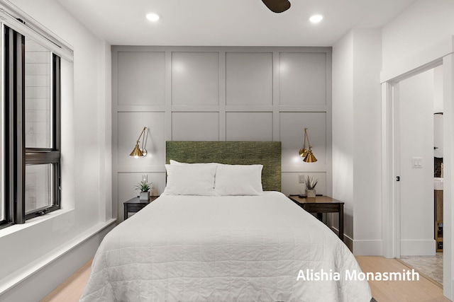300 Washington Ave Unit 1, Grand Haven, MI 49417 - bedroom with a decorative wall and recessed lighting