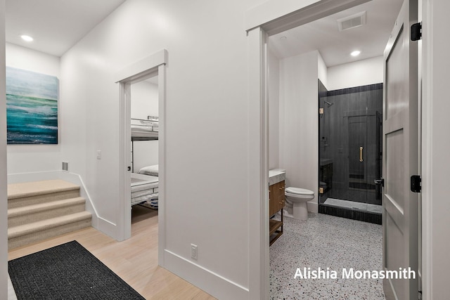 300 Washington Ave Unit 1, Grand Haven, MI 49417 - bathroom featuring a stall shower, vanity, and recessed lighting