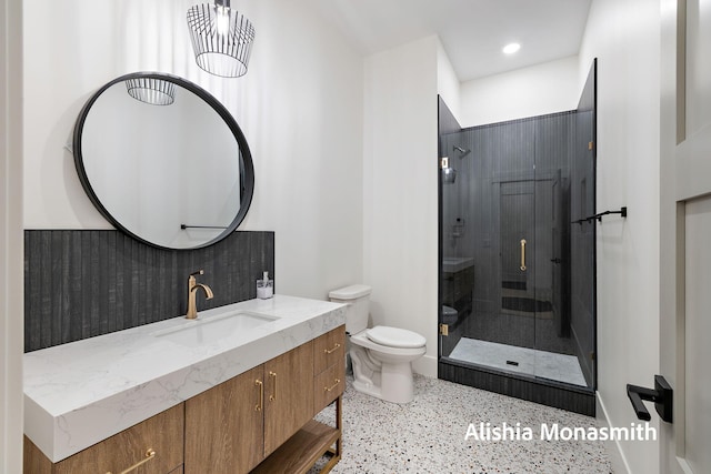 300 Washington Ave Unit 1, Grand Haven, MI 49417 - bathroom with speckled floor, vanity, a shower stall, backsplash, and recessed lighting