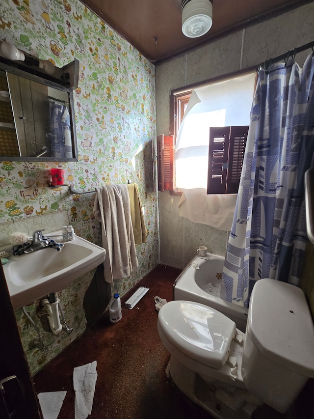 full bath featuring wallpapered walls, toilet, and a sink