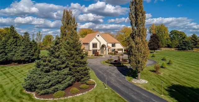 view of front of house with a front lawn