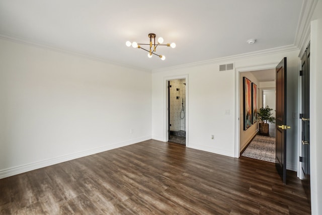 empty room with a chandelier, visible vents, crown molding, and dark wood-style floors