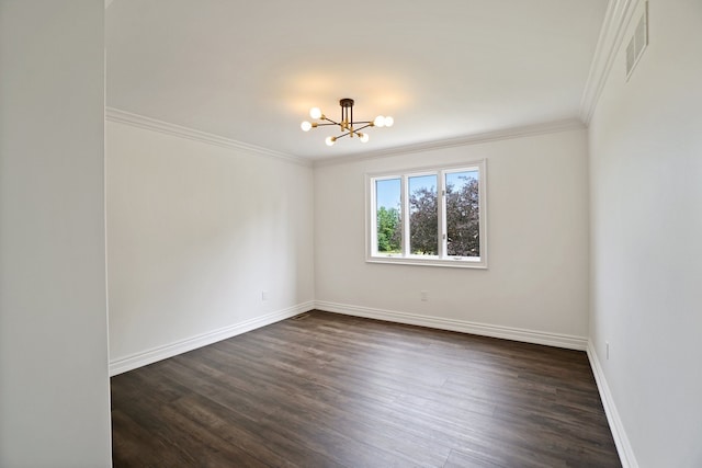 empty room featuring visible vents, dark wood-style floors, crown molding, baseboards, and a chandelier