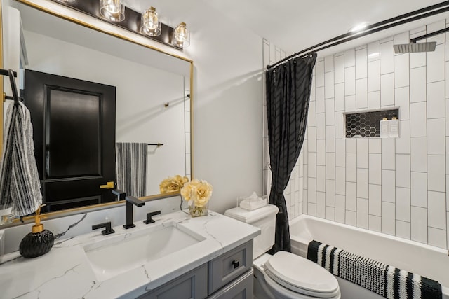 full bathroom featuring vanity, toilet, and shower / tub combo with curtain