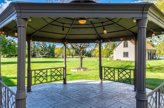 view of patio featuring a gazebo and a ceiling fan