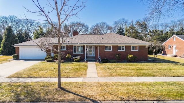 ranch-style house with concrete driveway, a front yard, a garage, brick siding, and a chimney