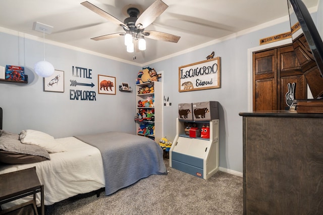 bedroom featuring crown molding, carpet flooring, baseboards, and ceiling fan