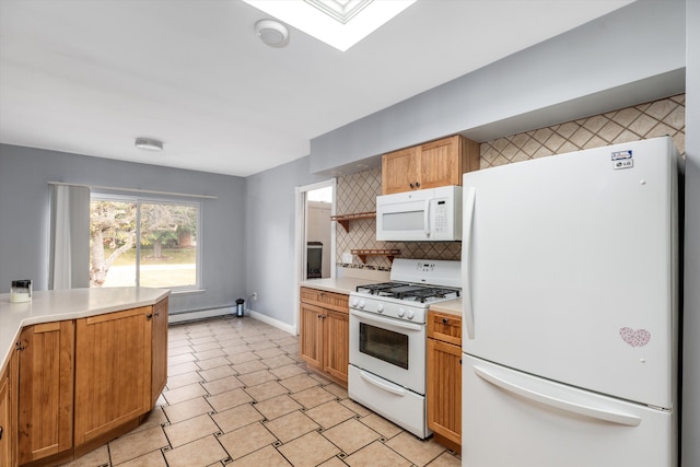 kitchen featuring a baseboard radiator, white appliances, tasteful backsplash, and light countertops