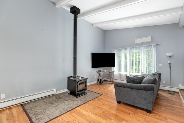 living room with a wall mounted air conditioner, beamed ceiling, a baseboard heating unit, light wood finished floors, and a wood stove