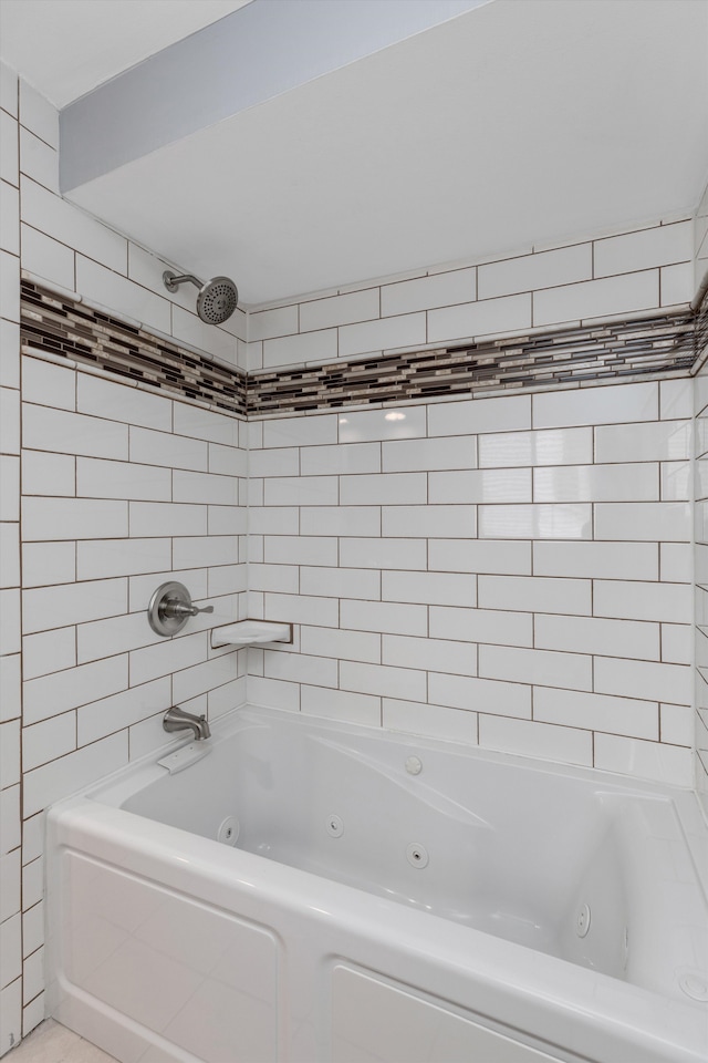 bathroom featuring a combined bath / shower with jetted tub