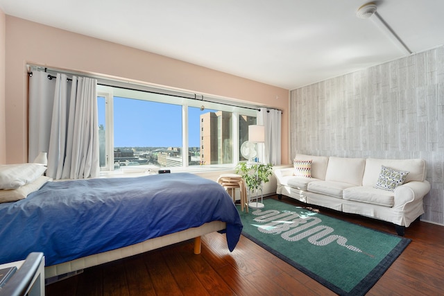 bedroom featuring wood finished floors