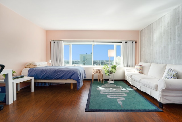 bedroom with hardwood / wood-style floors