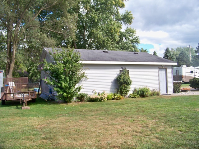 exterior space with a wooden deck and a yard