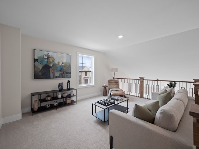 living area featuring vaulted ceiling, recessed lighting, baseboards, and carpet floors