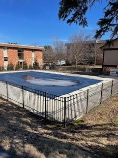 view of pool with fence