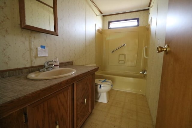 full bathroom with tub / shower combination, wallpapered walls, toilet, tile patterned floors, and vanity