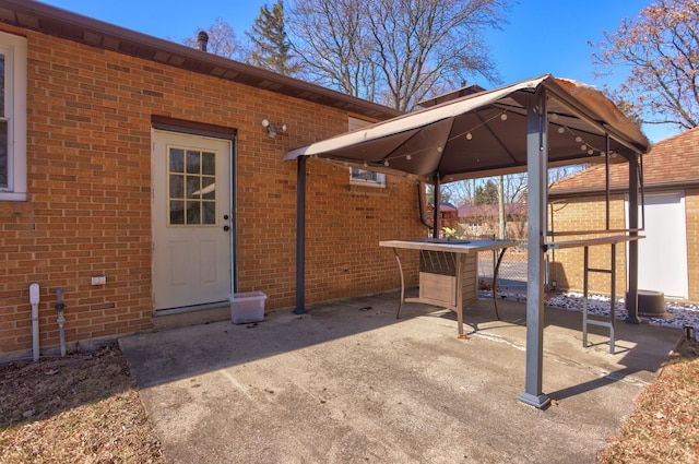 view of patio featuring a gazebo