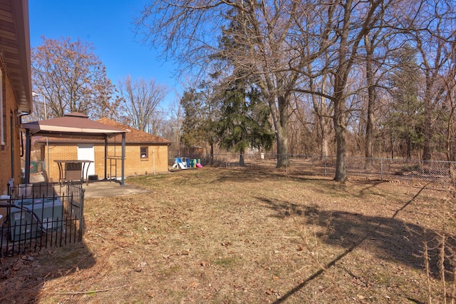 view of yard featuring a gazebo and a fenced backyard