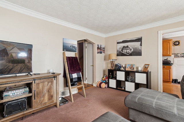 carpeted living room featuring ornamental molding