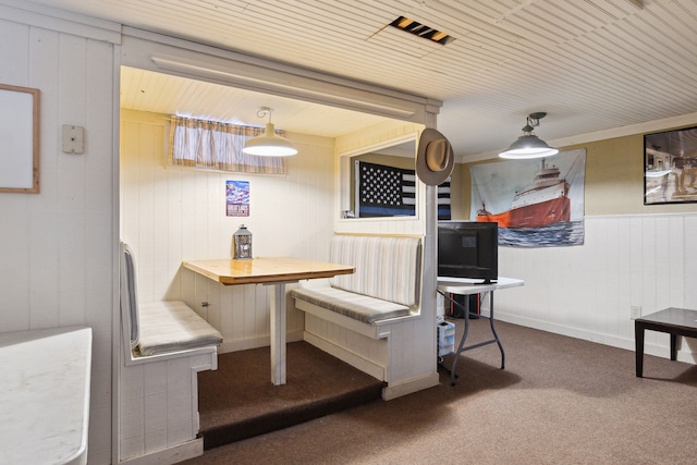 dining area with carpet flooring